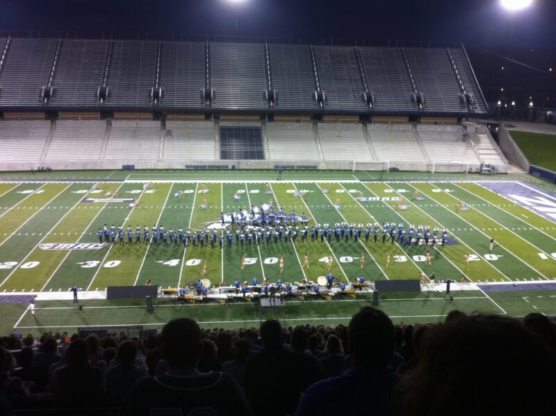 A picture of the Bluecoats drum and bugle corps performing their 2010 program, Metropolis: The Future Is Now, at their Innovations In Brass home show at Summa Field in Infocision Stadium at the University of Akron.