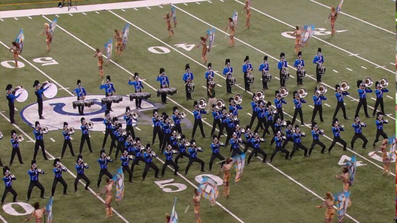 A photo of the 2010 Bluecoats during their performance of Metropolis: The Future Is Now, at Drum Corps International Championships.