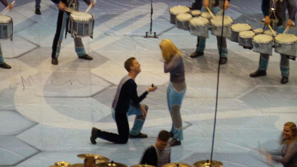 Zac and Alyssa Sterling, on the floor during the 2015 WGI Finals performance of Matrix, as Zac proposes to Alyssa. 
