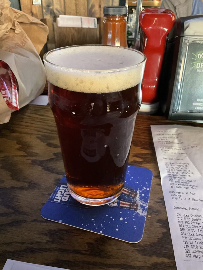 A draft pint of Thirsty Dog’s Irish Setter red ale on the bar at the Winking Lizard. 